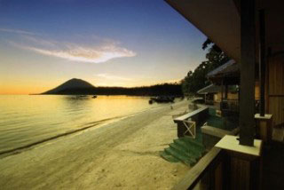 The view from the beachfront rooms at Bastianos Bunaken Diving Resort, across Liang Beach to Manado Tua, Bunaken Island, Manado The view from the beachfront rooms at Bastianos Bunaken Diving Resort, across Liang Beach to Manado Tua, Bunaken Island, Manado