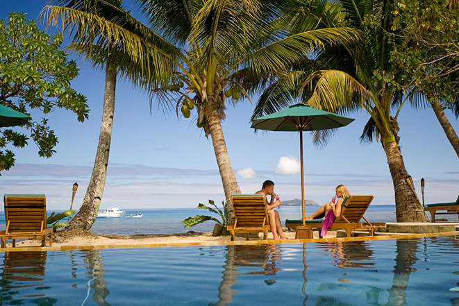 Relaxing by the pool at Beqa Lagoon Resort in Fiji