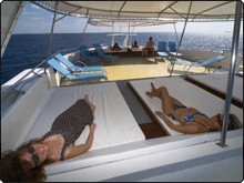 Relaxing on MV Amba's shaded upper deck after glorious Maldives diving