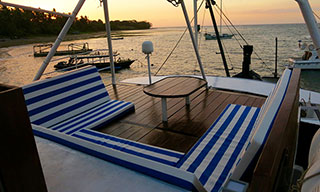 Relax on the sundeck of budget liveaboard MV Empress II