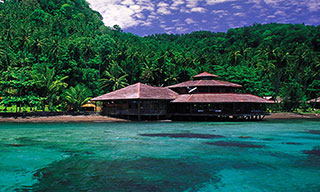 Set right on the beach Kungkungan Bay Resort is a Lembeh Strait scuba diving heaven