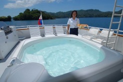 Would you care for a drink as you soak in the hot tub?