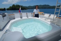 Would you care for a drink as you soak in the hot tub?