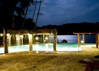 Kungkungan Bay Resort's infinity pool on the water's edge at Lembeh