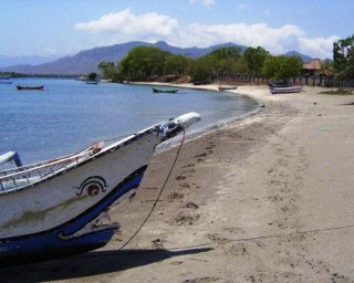 Typical beach scene from north Bali with Bali Barat National Park in the background - photo courtesy of Abyss Diving Safaris