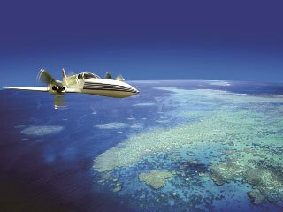 Jetstar flying over the Great Barrier Reef - photo courtesy of Mike Ball Expeditions