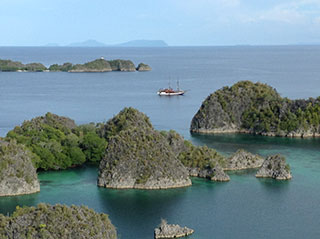 Sea Safari VII sitting at anchor in Raja Ampat