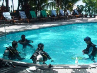 Students can learn the basics of diving in the safe confines of a pool at SMART before entering the adventurous waters of Borneo