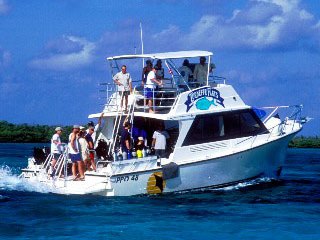 Miss Ellie, the boat used for larger dive groups at Turneffe Flats Resort