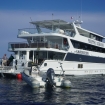 Stern view of the Philippines Aggressor with dive tender