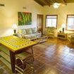 The Garden Villa's spacious common room includes satellite television